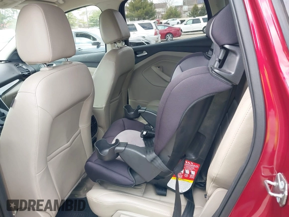 2016 Ford Escape Titanium with VIN 1FMCU9JX2GUA89716, listed as a IAAI auction lot 41899786 with 85,474 mi miles and . Bid and sale history available at DreamBid. Image 19.