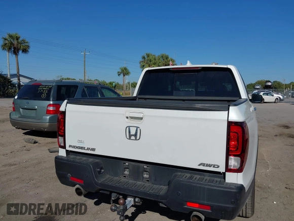 2021 Honda Ridgeline RTL-E with VIN 5FPYK3F7XMB011525, listed as a IAAI auction lot 41774012 with 98,031 mi miles and . Bid and sale history available at DreamBid. Image 16.