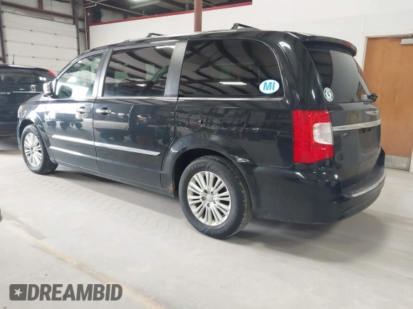 2013 Chrysler Town & Country Limited with VIN 2C4RC1GG0DR509167, listed as a IAAI auction lot 41973819 with 186,896 mi miles. Bid and sale history available at carsss.com. Image 3.