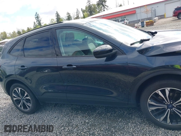 2022 Ford Escape SE Hybrid z VIN 1FMCU9BZ5NUA06681, wystawiony jako IAAI lot #42302156 z przebiegiem 61 582 mil mil oraz . Historia ofert i sprzedaży dostępna na DreamBid. Obrazek 14.