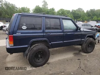 1997 Jeep Cherokee Country with VIN 1J4FJ78S4VL589852, listed as a Copart auction lot 56294015 with 189,530 mi miles and Salvage title. Bid and sale history available at DreamBid. Image 3.