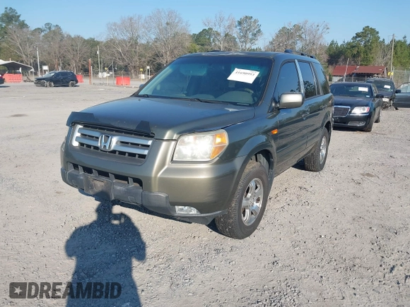 2006 Honda Pilot EX-L with VIN 5FNYF18766B026721, listed as a IAAI auction lot 41690993 with 219,473 mi miles and . Bid and sale history available at DreamBid. Image 2.
