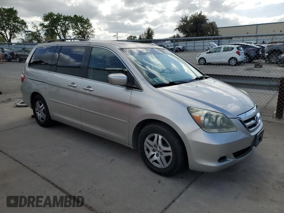 2005 Honda Odyssey EX-L z VIN 5FNRL38655B408107, wystawiony jako Copart lot #50918155 z przebiegiem 215 920 mil mil oraz Szkoda całkowita • Salvage title. Historia ofert i sprzedaży dostępna na DreamBid. Obrazek 4.