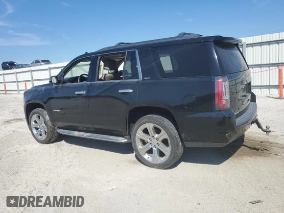 2018 GMC Yukon SLT with VIN 1GKS1BKC9JR108210, listed as a Copart auction lot 50465765 with 106,542 mi miles and Salvage Title. Bid and sale history available at carsss.com. Image 2.