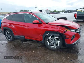 2022 Hyundai Tucson SEL with VIN 5NMJF3AE2NH115088, listed as a IAAI auction lot 41915800 with 13,120 mi miles and . Bid and sale history available at DreamBid. Image 6.