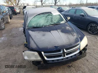 2013 Dodge Avenger SE with VIN 1C3CDZAB1DN665198, listed as a IAAI auction lot 41452523 with 144,249 mi miles. Bid and sale history available at carsss.com. Image 13.