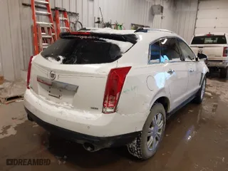 2016 Cadillac SRX Luxury Collection with VIN 3GYFNEE34GS582435, listed as a IAAI auction lot 41325240 with 164,162 mi miles. Bid and sale history available at carsss.com. Image 4.