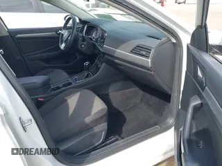 2021 Volkswagen Jetta S z VIN 3VWC57BU0MM021874, wystawiony jako IAAI lot #42124747 z przebiegiem 89 887 mil mil oraz . Historia ofert i sprzedaży dostępna na DreamBid. Obrazek 5.