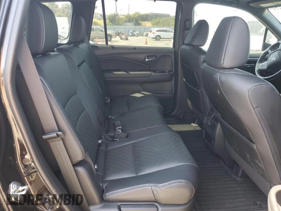2020 Honda Passport EX-L z VIN 5FNYF8H54LB000315, wystawiony jako Copart lot #59194895 z przebiegiem 52 048 mil mil oraz Szkoda całkowita • Salvage title. Historia ofert i sprzedaży dostępna na DreamBid. Obrazek 11.