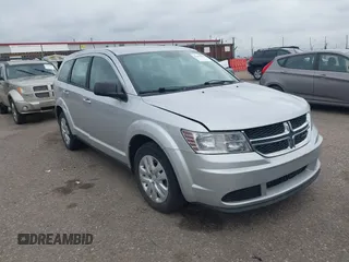 2014 Dodge Journey American Value with VIN 3C4PDCAB2ET159892, listed as a IAAI auction lot 42496525 with 144,966 mi miles and . Bid and sale history available at DreamBid. Image 1.