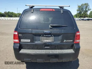 2010 Ford Escape Hybrid with VIN 1FMCU4K38AKC98072, listed as a Copart auction lot 58192375 with 123,958 mi miles and Salvage title. Bid and sale history available at DreamBid. Image 6.