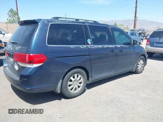 2010 Honda Odyssey EX-L with VIN 5FNRL3H73AB107662, listed as a IAAI auction lot 42107166 with 188,308 mi miles. Bid and sale history available at carsss.com. Image 4.