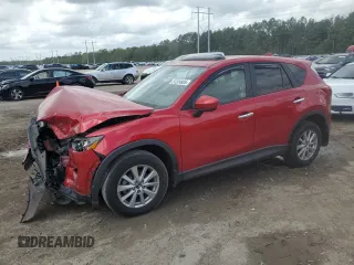2014 Mazda CX-5 Touring with VIN JM3KE2CY2E0411065, listed as a Copart auction lot 51324885 with 142,660 mi miles and Salvage Title. Bid and sale history available at carsss.com. Image 1.
