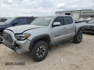2021 Toyota Tacoma SR z VIN 5TFCZ5AN1MX250841, wystawiony jako Copart lot #53049695 z przebiegiem 63 755 mil mil oraz Szkoda całkowita • Salvage title. Historia ofert i sprzedaży dostępna na DreamBid. Obrazek 1.