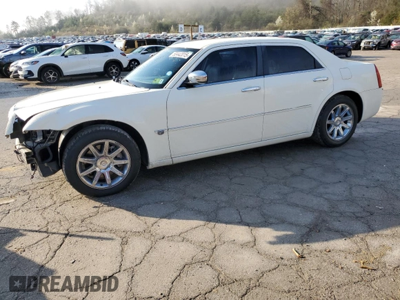 2006 Chrysler 300 C with VIN 2C3KA63H86H388808, listed as a Copart auction lot 50442015 with 129,848 mi miles and Salvage Title. Bid and sale history available at carsss.com. Image 1.
