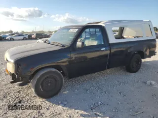 1993 Toyota T100 z VIN JT4VD10C8P0005158, wystawiony jako Copart lot #82199974 z przebiegiem 171 221 mil mil oraz Tytuł czysty. Historia ofert i sprzedaży dostępna na DreamBid. Obrazek 1.