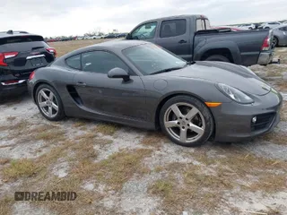 2015 Porsche Cayman with VIN WP0AA2A87FK161539, listed as a IAAI auction lot 40553548 with 10,545 mi miles and . Bid and sale history available at DreamBid. Image 1.