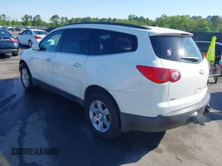 2012 Chevrolet Traverse 1LT z VIN 1GNKVGEDXCJ204602, wystawiony jako IAAI lot #41943724 z przebiegiem 151 118 mil mil oraz . Historia ofert i sprzedaży dostępna na DreamBid. Obrazek 3.