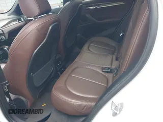 2018 BMW X1 xDrive28i with VIN WBXHT3C36J5L32162, listed as a IAAI auction lot 41802315 with 80,422 mi miles. Bid and sale history available at carsss.com. Image 8.