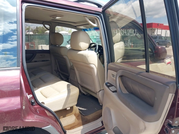 2002 Toyota Land Cruiser with VIN JTEHT05J422022565, listed as a IAAI auction lot 42042565 with 550,000 mi miles. Bid and sale history available at carsss.com. Image 8.