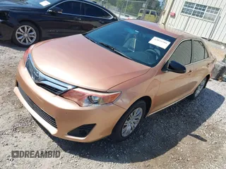 2012 Toyota Camry L with VIN 4T1BF1FKXCU030959, listed as a IAAI auction lot 42022501 with 304,524 mi miles. Bid and sale history available at carsss.com. Image 2.