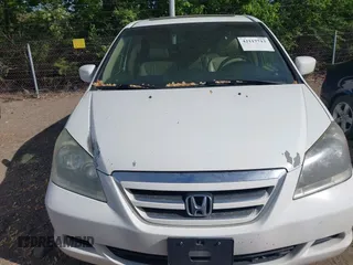 2007 Honda Odyssey EX-L with VIN 5FNRL38707B145049, listed as a IAAI auction lot 42117713 with 76,691 mi miles. Bid and sale history available at carsss.com. Image 6.