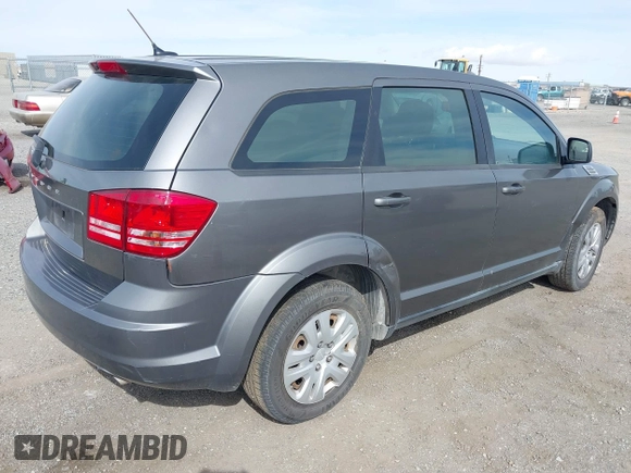 2013 Dodge Journey SE with VIN 3C4PDCAB7DT675440, listed as a IAAI auction lot 41927853 with 263,264 mi miles. Bid and sale history available at carsss.com. Image 4.