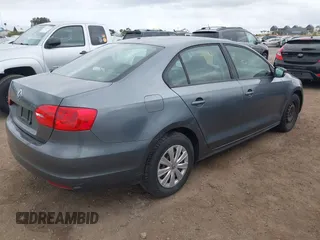 2012 Volkswagen Jetta Sedan S with VIN 3VW2K7AJ7CM309224, listed as a IAAI auction lot 42128641 with 127,702 mi miles. Bid and sale history available at carsss.com. Image 4.