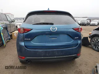 2017 Mazda CX-5 Grand Touring with VIN JM3KFADL9H0187338, listed as a IAAI auction lot 41382034 with 141,972 mi miles and . Bid and sale history available at carsss.com. Image 17.