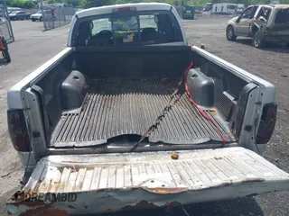 2004 Dodge Dakota Sport with VIN 1D7HG38N24S707004, listed as a IAAI auction lot 42201115 with 195,896 mi miles and . Bid and sale history available at carsss.com. Image 6.