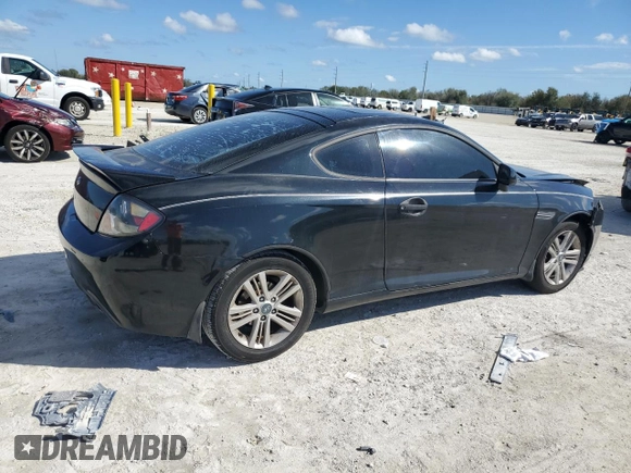 2008 Hyundai Tiburon GS z VIN KMHHM66D08U291605, wystawiony jako Copart lot #46589265 z przebiegiem 177 104 mil mil oraz Szkoda całkowita • Salvage title. Historia ofert i sprzedaży dostępna na DreamBid. Obrazek 3.