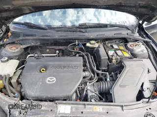 2006 Mazda 3 S Grand Touring with VIN JM1BK344061487799, listed as a IAAI auction lot 41758105 with 98,698 mi miles and . Bid and sale history available at DreamBid. Image 10.