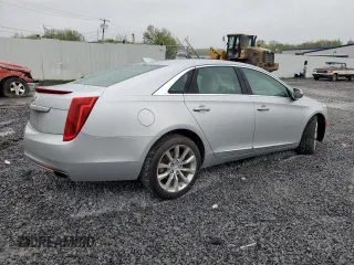 2016 Cadillac XTS Luxury Collection z VIN 2G61N5S31G9194437, wystawiony jako Copart lot #56017485 z przebiegiem 75 979 mil mil oraz Szkody całkowita. Historia ofert i sprzedaży dostępna na DreamBid. Obrazek 3.
