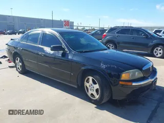 2000 Lincoln LS with VIN 1LNHM86S4YY818127, listed as a IAAI auction lot 41329978 with 158,134 mi miles. Bid and sale history available at carsss.com. Image 1.