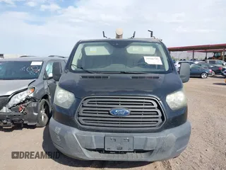 2016 Ford Transit Cargo with VIN 1FTYE1YM7GKB56682, listed as a IAAI auction lot 39506785 with 221,399 mi miles and . Bid and sale history available at DreamBid. Image 12.