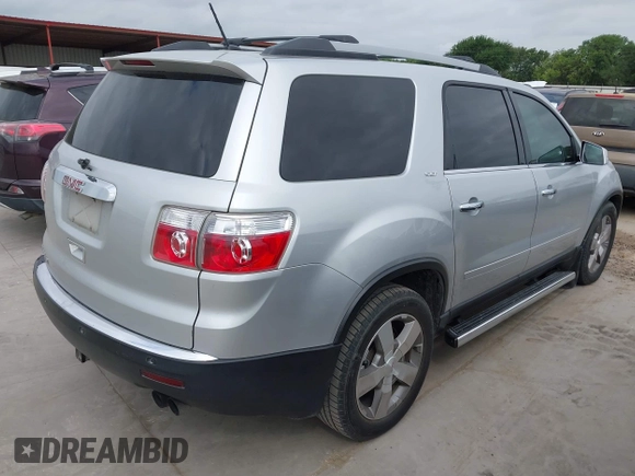 2011 GMC Acadia SLT1 with VIN 1GKKRRED0BJ172027, listed as a IAAI auction lot 42091150 with 170,436 mi miles and . Bid and sale history available at DreamBid. Image 4.