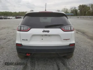 2019 Jeep Cherokee Trailhawk z VIN 1C4PJMBX9KD256968, wystawiony jako Copart lot #51591025 z przebiegiem 110 746 mil mil oraz Szkoda całkowita • Salvage title. Historia ofert i sprzedaży dostępna na DreamBid. Obrazek 6.