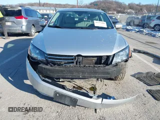 2014 Volkswagen Passat S w/Nav with VIN 1VWAP7A35EC052552, listed as a IAAI auction lot 41377109 with 123,273 mi miles. Bid and sale history available at carsss.com. Image 6.