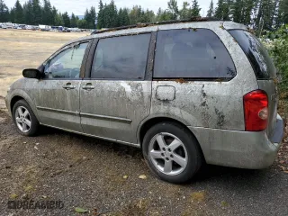 2003 Mazda MPV LX with VIN JM3LW28J030350695, listed as a Copart auction lot 68644034 with 121,200 mi miles and Salvage Title. Bid and sale history available at carsss.com. Image 2.