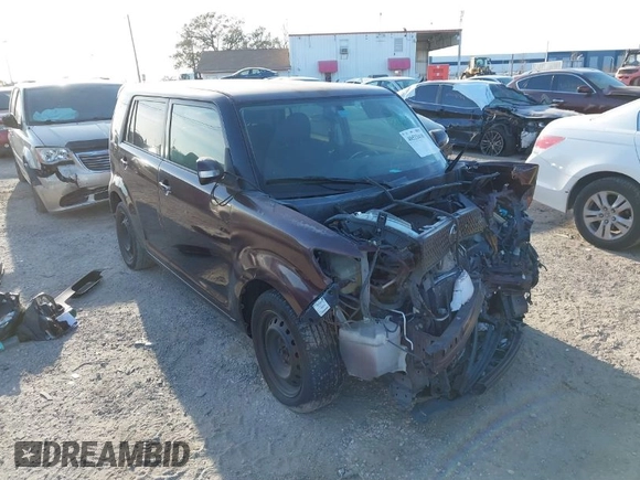 2010 Scion xB with VIN JTLZE4FE8A1113455, listed as a IAAI auction lot 40523410 with 1 mi miles. Bid and sale history available at carsss.com. Image 1.
