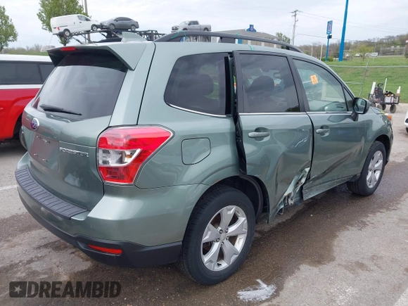 2016 Subaru Forester Limited with VIN JF2SJARCXGH406079, listed as a IAAI auction lot 41974522 with 64,910 mi miles and . Bid and sale history available at DreamBid. Image 4.