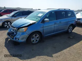 2010 Honda Odyssey Touring with VIN 5FNRL3H92AB056186, listed as a IAAI auction lot 41851386 with 199,109 mi miles. Bid and sale history available at carsss.com. Image 17.