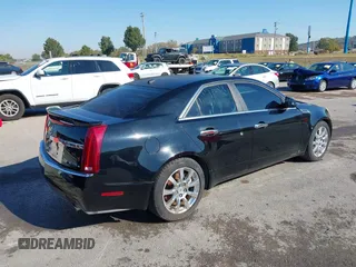 2008 Cadillac CTS AWD w/1SB with VIN 1G6DT57V280213375, listed as a IAAI auction lot 40646045 with 125,835 mi miles. Bid and sale history available at carsss.com. Image 4.