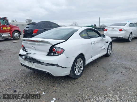 2008 Hyundai Tiburon GS z VIN KMHHM66D58U283273, wystawiony jako IAAI lot #41900097 z przebiegiem 154 013 mil mil oraz . Historia ofert i sprzedaży dostępna na DreamBid. Obrazek 4.