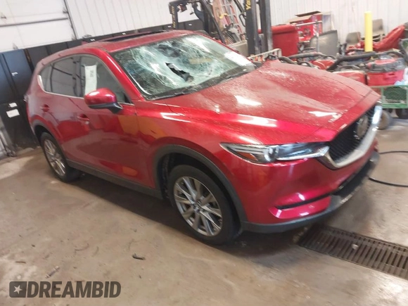 2020 Mazda CX-5 Grand Touring with VIN JM3KFBDMXL0840847, listed as a IAAI auction lot 41732185 with 36,248 mi miles. Bid and sale history available at carsss.com. Image 1.