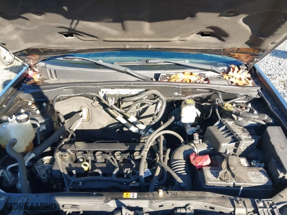 2010 Mazda Tribute Touring with VIN 4F2CY9C73AKM04595, listed as a IAAI auction lot 40797681 with 122,774 mi miles. Bid and sale history available at carsss.com. Image 10.