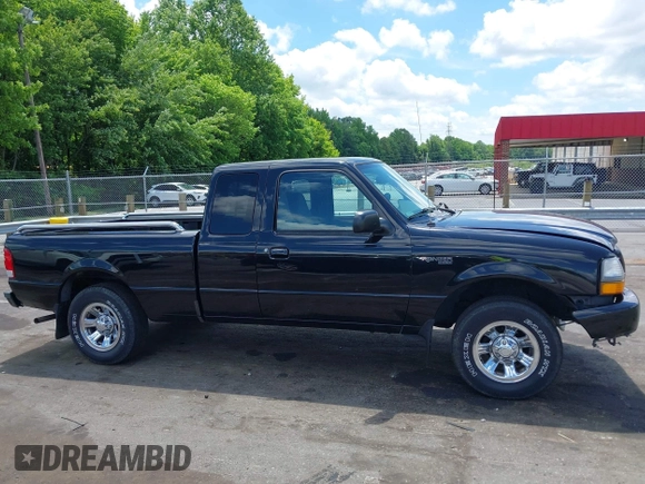 2000 Ford Ranger XL z VIN 1FTYR14V9YTA24442, wystawiony jako IAAI lot #42240524 z przebiegiem 152 668 mil mil oraz . Historia ofert i sprzedaży dostępna na DreamBid. Obrazek 13.