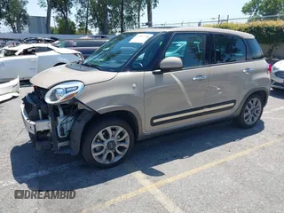 2015 FIAT 500L Urbana Trekking z VIN ZFBCFADH2FZ033204, wystawiony jako IAAI lot #42267755 z przebiegiem 41 175 mil mil oraz . Historia ofert i sprzedaży dostępna na DreamBid. Obrazek 2.