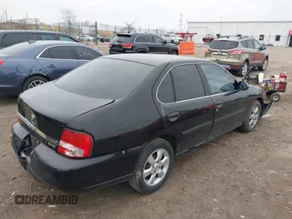 2000 Nissan Altima XE with VIN 1N4DL01D9YC104061, listed as a IAAI auction lot 41970227 with 176,515 mi miles and . Bid and sale history available at carsss.com. Image 4.