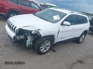 2016 Jeep Cherokee Latitude z VIN 1C4PJMCB3GW237461, wystawiony jako IAAI lot #42495278 z przebiegiem 102 417 mil mil oraz . Historia ofert i sprzedaży dostępna na DreamBid. Obrazek 18.